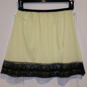 Green and black lace slip